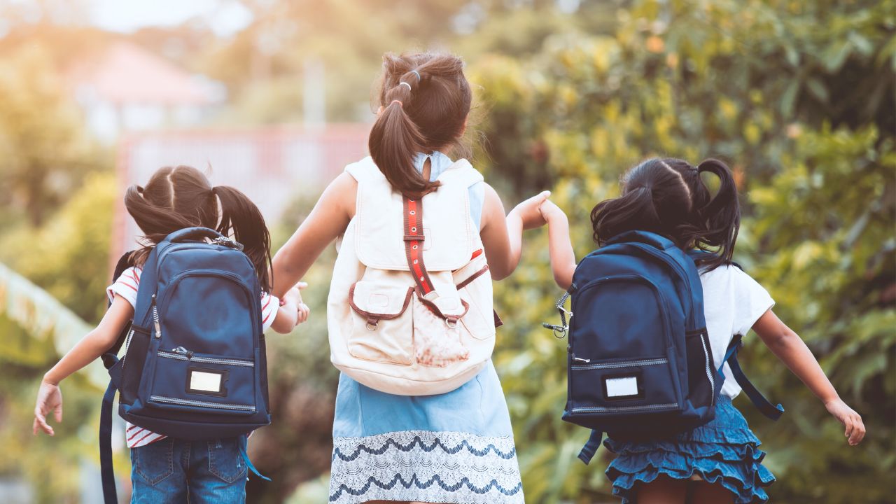 backpacks, three children, three different backpack styles